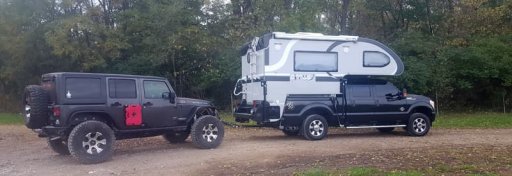 Cirrus-Camper-with-towed-Jeep.jpg