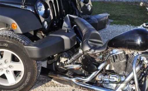 032417-dui-motorcycle-stuck-in-jeep-f.jpg
